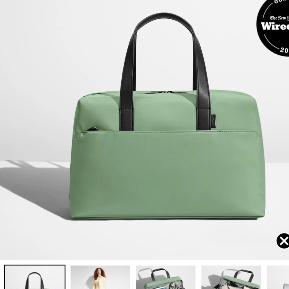 NWT fully paper wrapped handles and zipper pull. Away Everything Bag.